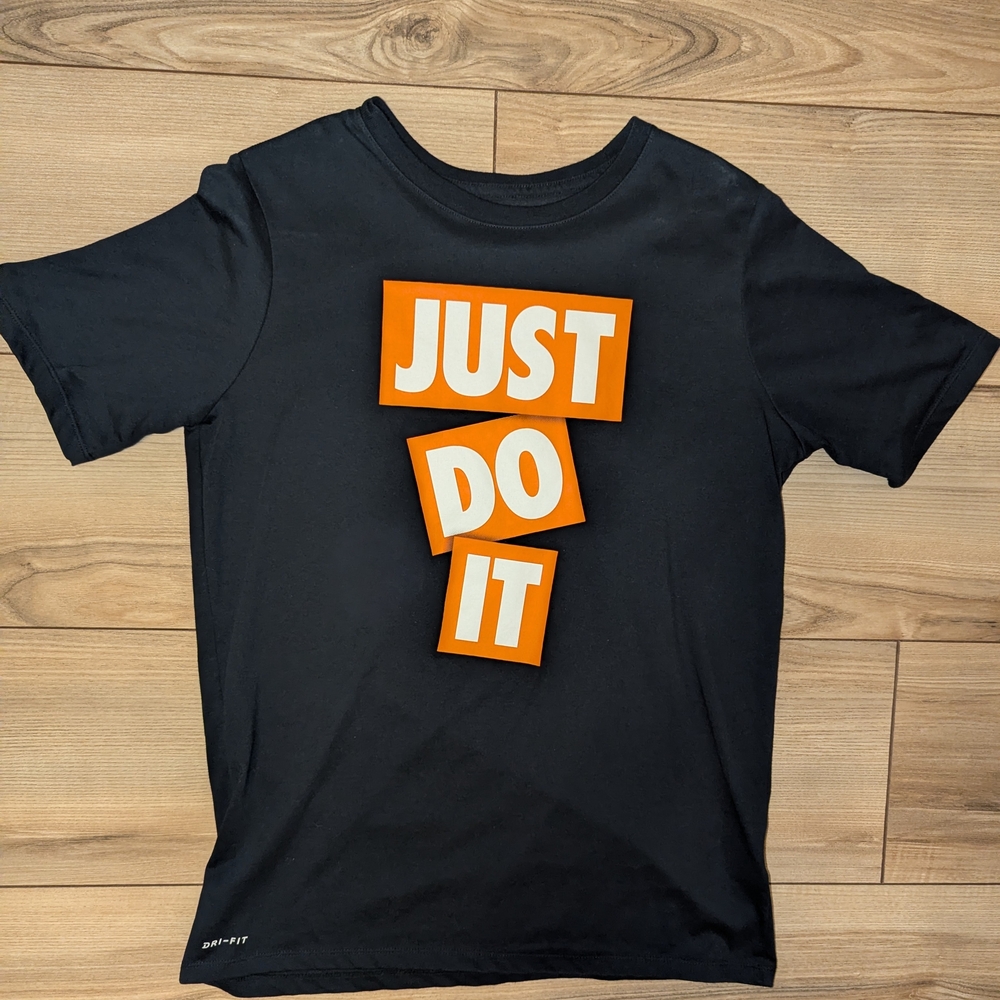 Nike Kids Black Tee with Bold Orange 'Just Do It' Design